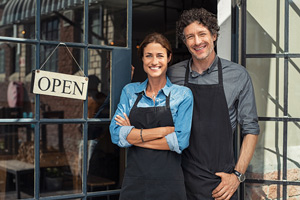 Two-cheerful-small-business-owners-300x200 Smiling Business Owners